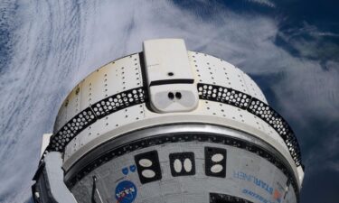 Boeing's Starliner spacecraft is pictured docked to the International Space Station's forward-facing port of the Harmony module as the orbiting lab soared 264 miles above the Atlantic Ocean on June 15.