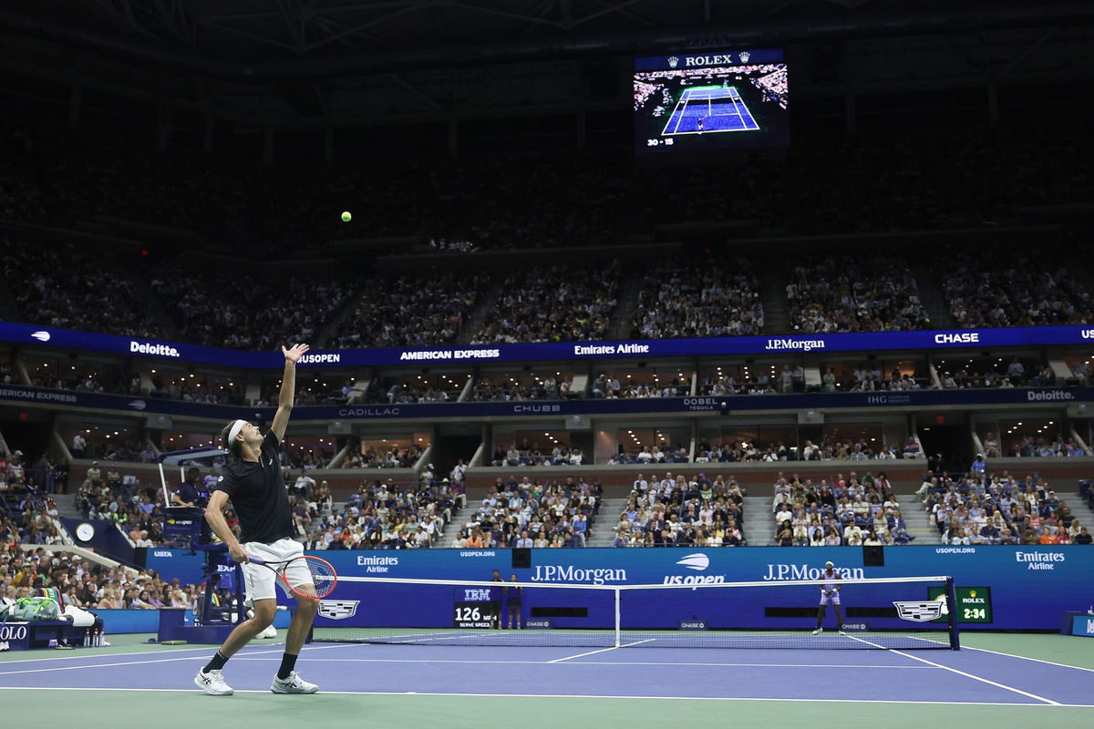 <i>Matthew Stockman/Getty Images via CNN Newsource</i><br/>Taylor Fritz serves against Frances Tiafoe during their semifinal.