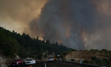 Fire crews monitor the Line Fire on Saturday