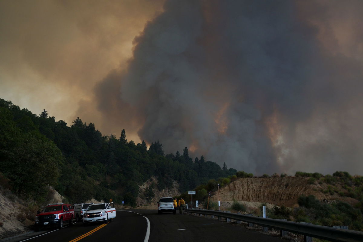 <i>Eric Thayer/AP via CNN Newsource</i><br/>Fire crews monitor the Line Fire on Saturday