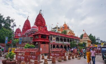 People come from miles away to pray at the Shri Digambar Jain Lal Temple (red) and the Hindu Gauri Shankar Temple (orange) at Chandni Chowk.