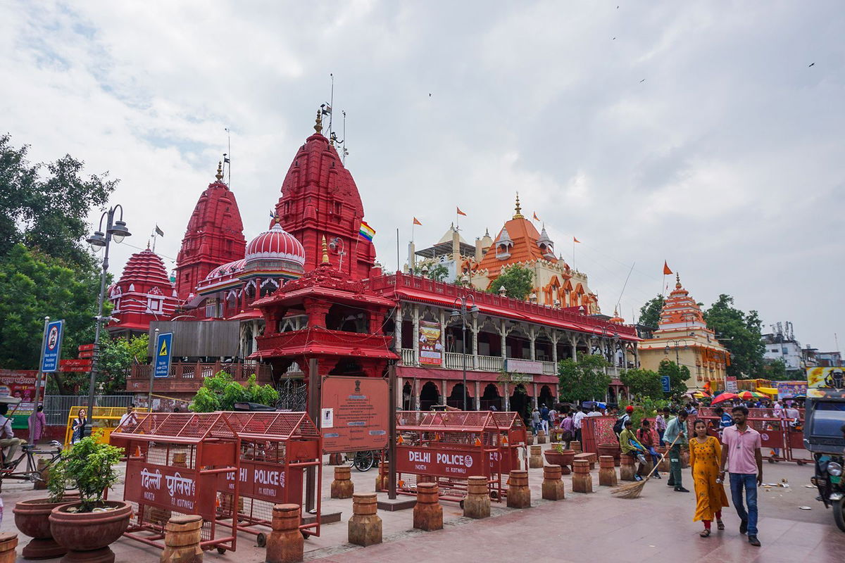 <i>Aishwarya S. Iyer/CNN via CNN Newsource</i><br/>People come from miles away to pray at the Shri Digambar Jain Lal Temple (red) and the Hindu Gauri Shankar Temple (orange) at Chandni Chowk.