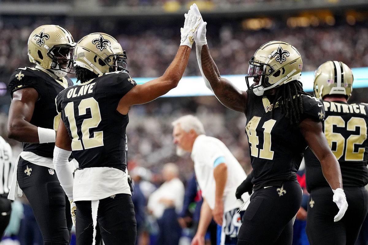 <i>Sam Hodde/Getty Images via CNN Newsource</i><br/>Alvin Kamara (right) scored four touchdowns as the New Orleans Saints beat the Dallas Cowboys.