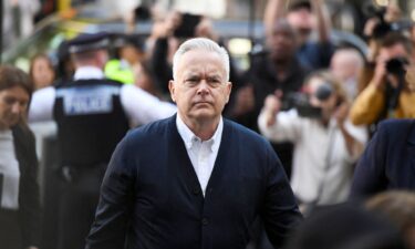 Huw Edwards arrives for sentencing at London's Westminster Magistrates' Court in London on Monday.