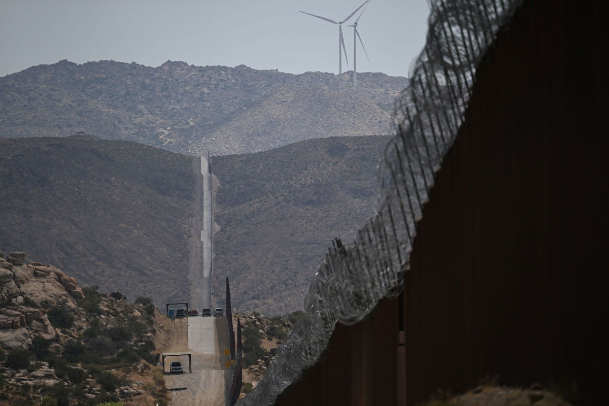 <i>Patrick T. Fallon/AFP/Getty Images via CNN Newsource</i><br/>US Customs and Border Protection Border Patrol vehicles sit parked along fencing between the United States and Mexico on August 1 in Jacumba Hot Springs