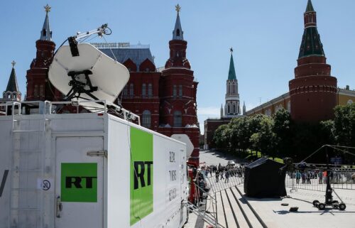 Vehicles of Russian state-controlled broadcaster Russia Today (RT) are seen near the Red Square in central Moscow