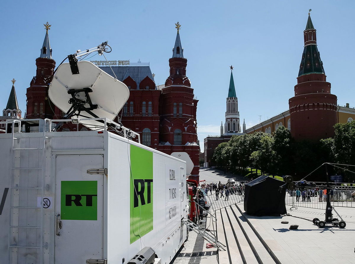 <i>Gleb Garanich/Reuters/File via CNN Newsource</i><br/>Vehicles of Russian state-controlled broadcaster Russia Today (RT) are seen near the Red Square in central Moscow