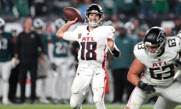 Atlanta Falcons quarterback Kirk Cousins throws a touchdown pass against the Philadelphia Eagles.