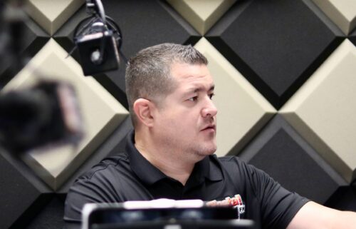 Fiesta 98.1 co-owner and radio personality Rogelio Regalado prepares to go on air.