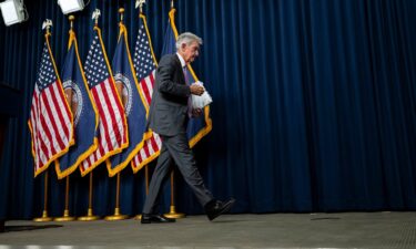 Federal Reserve Chair Jerome Powell departs after a press conference at the Federal Reserve in Washington