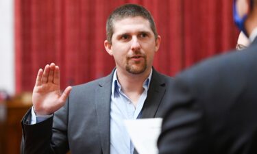 Derrick Evans is pictured at a swearing-in ceremony to the West Virginia House of Delegates on December 1