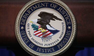 The Justice Department seal is seen on the lectern during a Hate Crimes Subcommittee summit on June 29