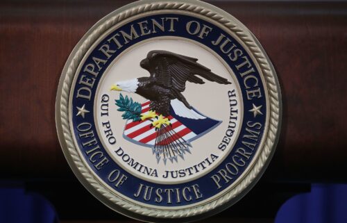 The Justice Department seal is seen on the lectern during a Hate Crimes Subcommittee summit on June 29