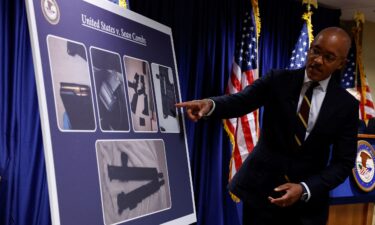 US Attorney Damian Williams pointed at a chart on September 17 showing the firearms seized during the search of Sean "Diddy" Combs' homes.