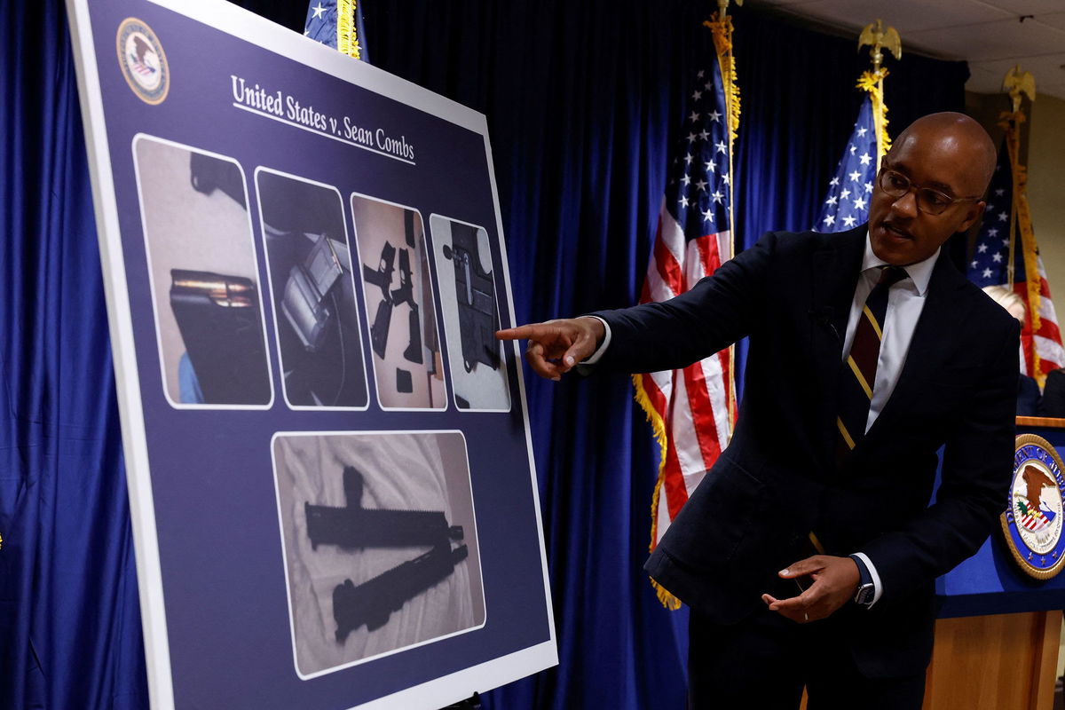 <i>Shannon Stapleton/Reuters via CNN Newsource</i><br/>US Attorney Damian Williams pointed at a chart on September 17 showing the firearms seized during the search of Sean 