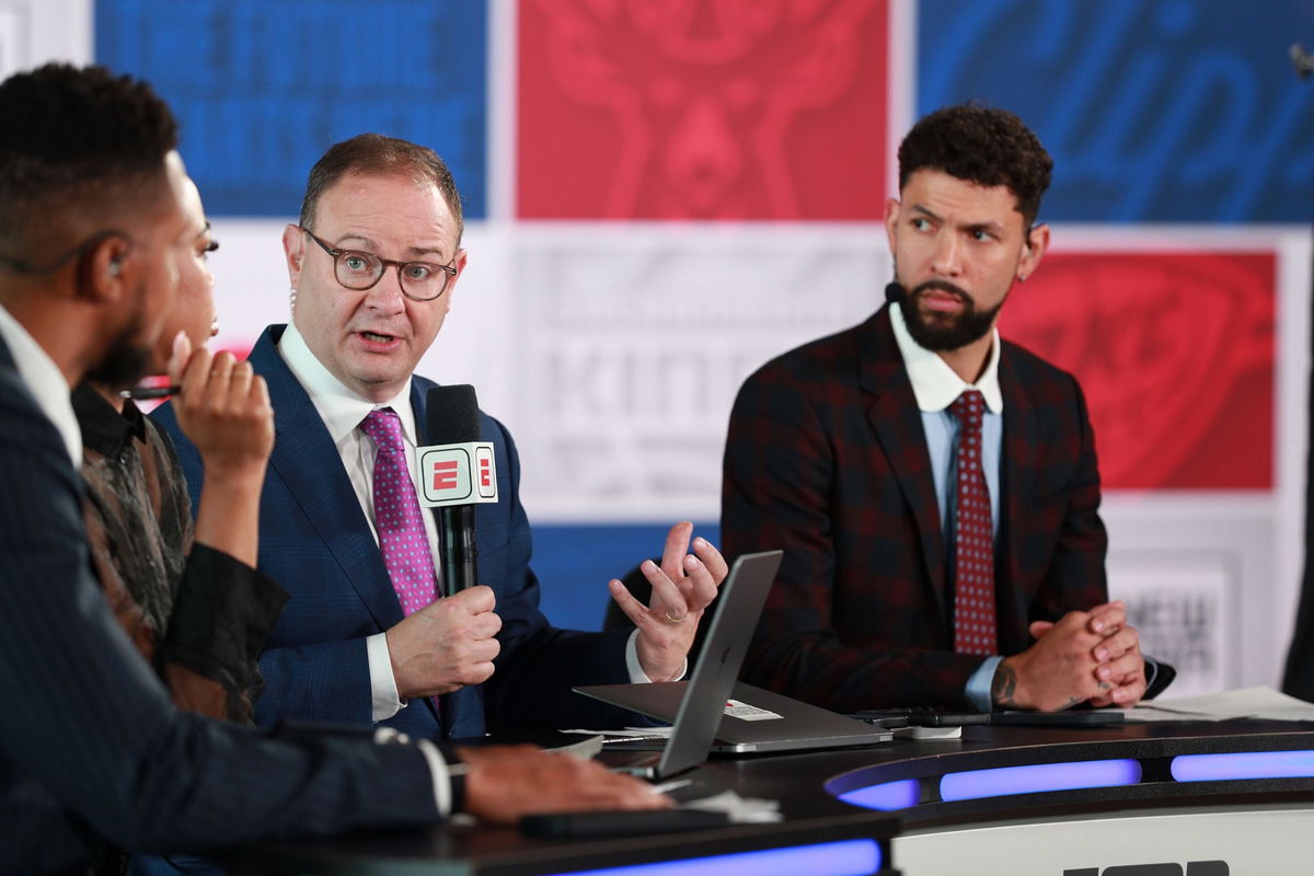 <i>Chris Marion/NBAE/Getty Images via CNN Newsource</i><br/>Adrian Wojnarowski reporting during the 2024 NBA Draft on June 26 at Barclays Center in Brooklyn