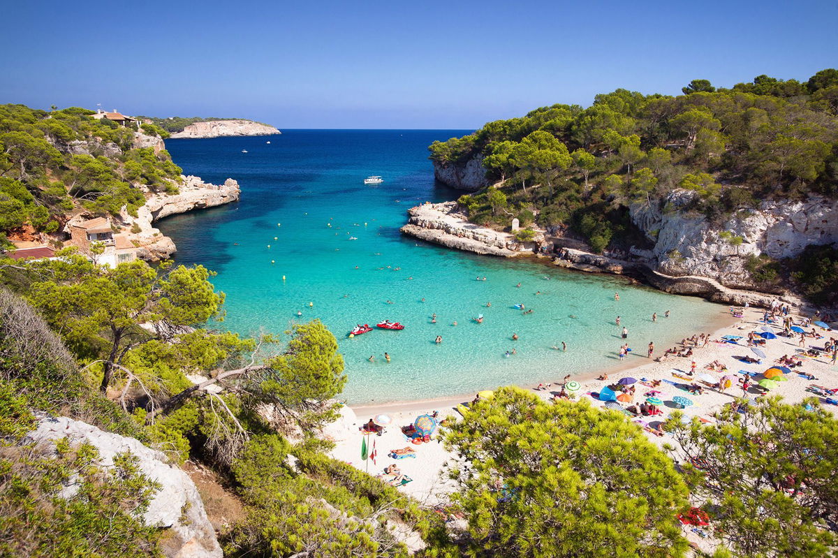 <i>Dennis Fischer Photography/Moment RF/Getty Images via CNN Newsource</i><br/>Life in Mallorca revolves around days at beaches such as Cala Llombards -- making Ted Purdom reluctant to leave the island.