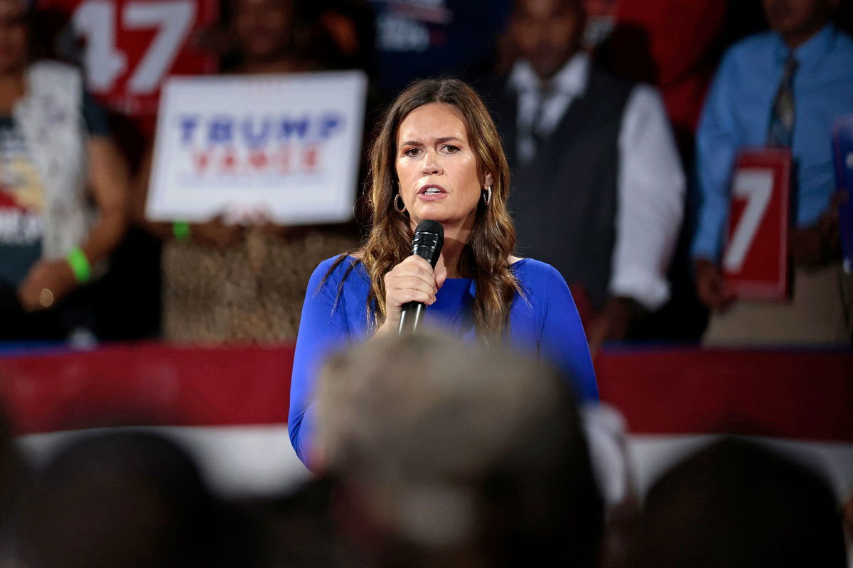 <i>Jeff Kowalsky/AFP/Getty Images via CNN Newsource</i><br/>Arkansas Gov. Sarah Huckabee Sanders moderates a town hall meeting with former President Donald Trump in Flint