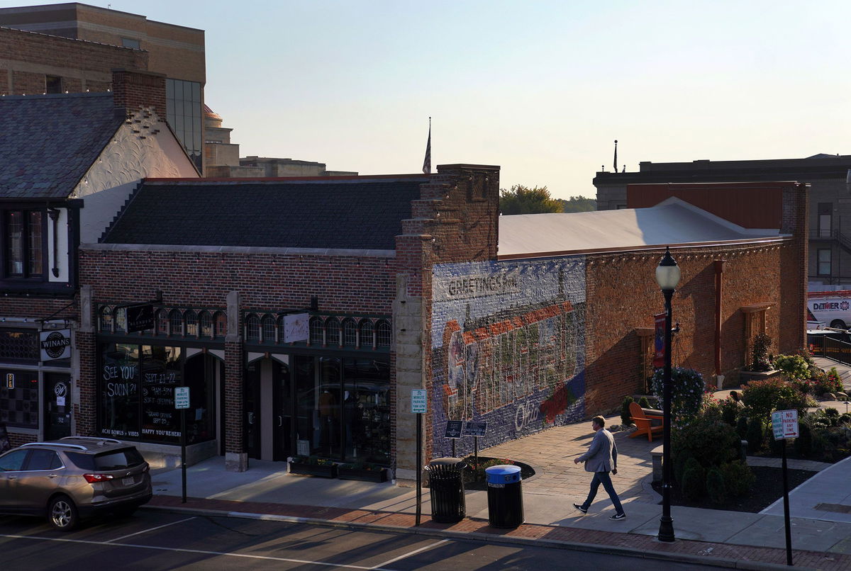 <i>Jessie Wardarski/AP via CNN Newsource</i><br/>A man walks through downtown Springfield