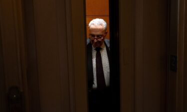 Senate Majority Leader Chuck Schumer walks off the Senate floor on Capitol Hill on September 16 in Washington