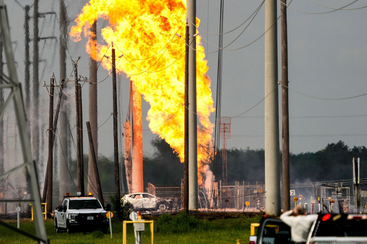 <i>Brett Coomer/Houston Chronicle/Getty Images via CNN Newsource</i><br/>A massive pipeline fire burns on Monday