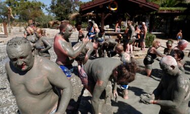 Tourists flock to Dalyan's mud baths to rejuvenate their skin.