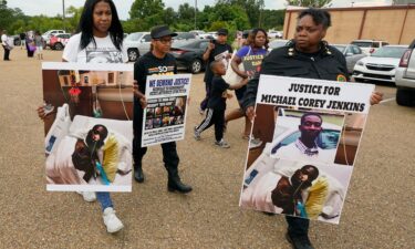 Activists march towards the Rankin County Sheriff's Office in Brandon