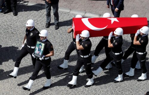 A guard of honour carries the Turkish flag-draped coffin of Aysenur Ezgi Eygi during her funeral ceremony in Didim.