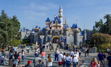 Visitors to Disneyland outside Sleeping Beauty Castle in Anaheim on September 3