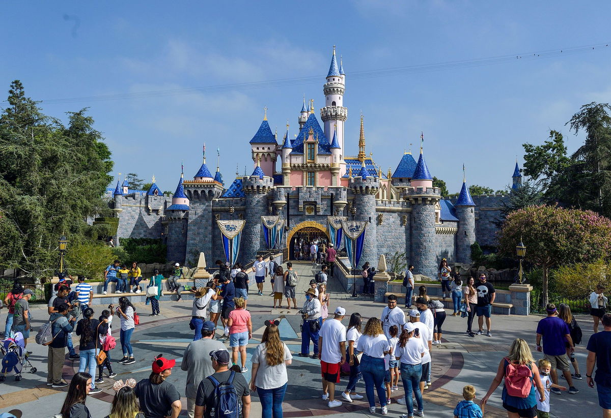 <i>Jeff Gritchen/MediaNews Group/Orange County Register/Getty Images/File via CNN Newsource</i><br/>Visitors to Disneyland outside Sleeping Beauty Castle in Anaheim on September 3