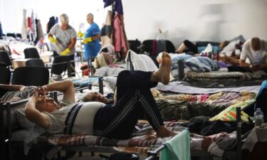 War-displaced people spend time in a centre for displaced people in undisclosed location in Kursk region on August 29