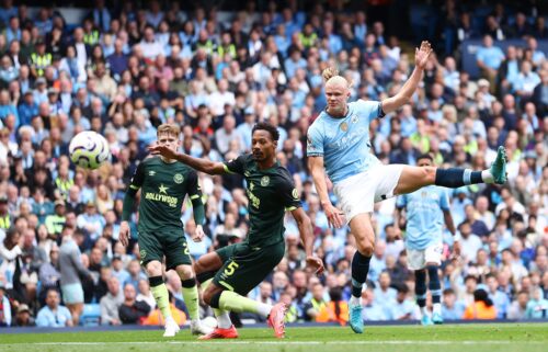 Erling Haaland scores his team's first goal against Brentford.