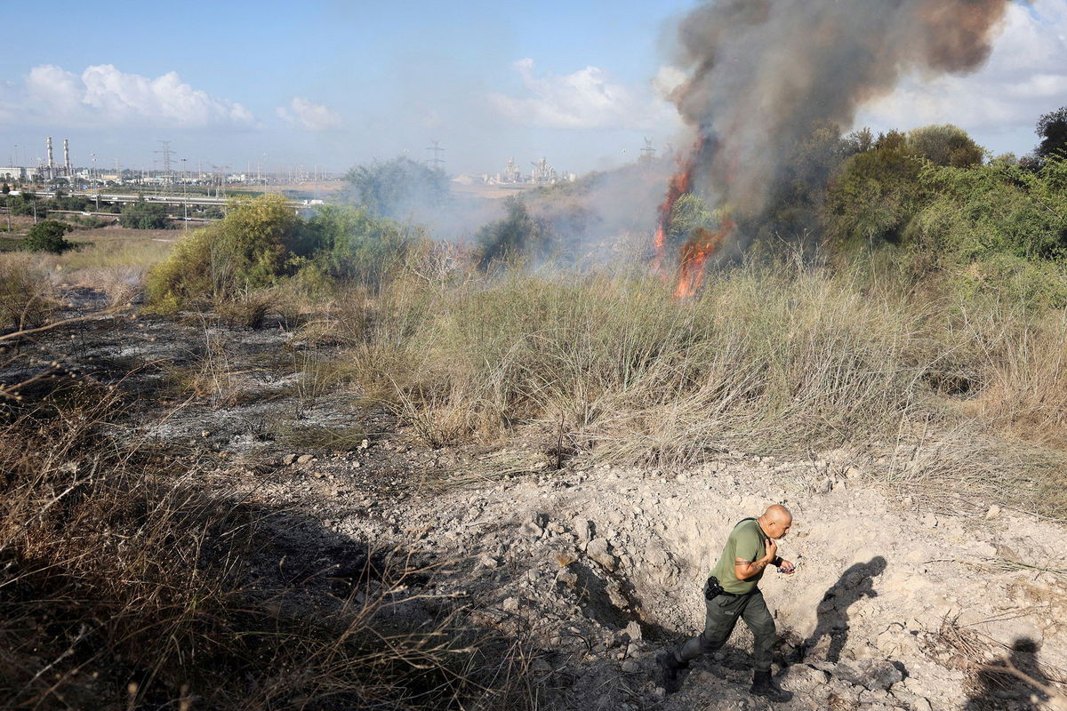 <i>Ronen Zvulun/Reuters via CNN Newsource</i><br/>Smoke billows after a missile which the IDF says was launched from Yemen lands in central Israel on September 15.