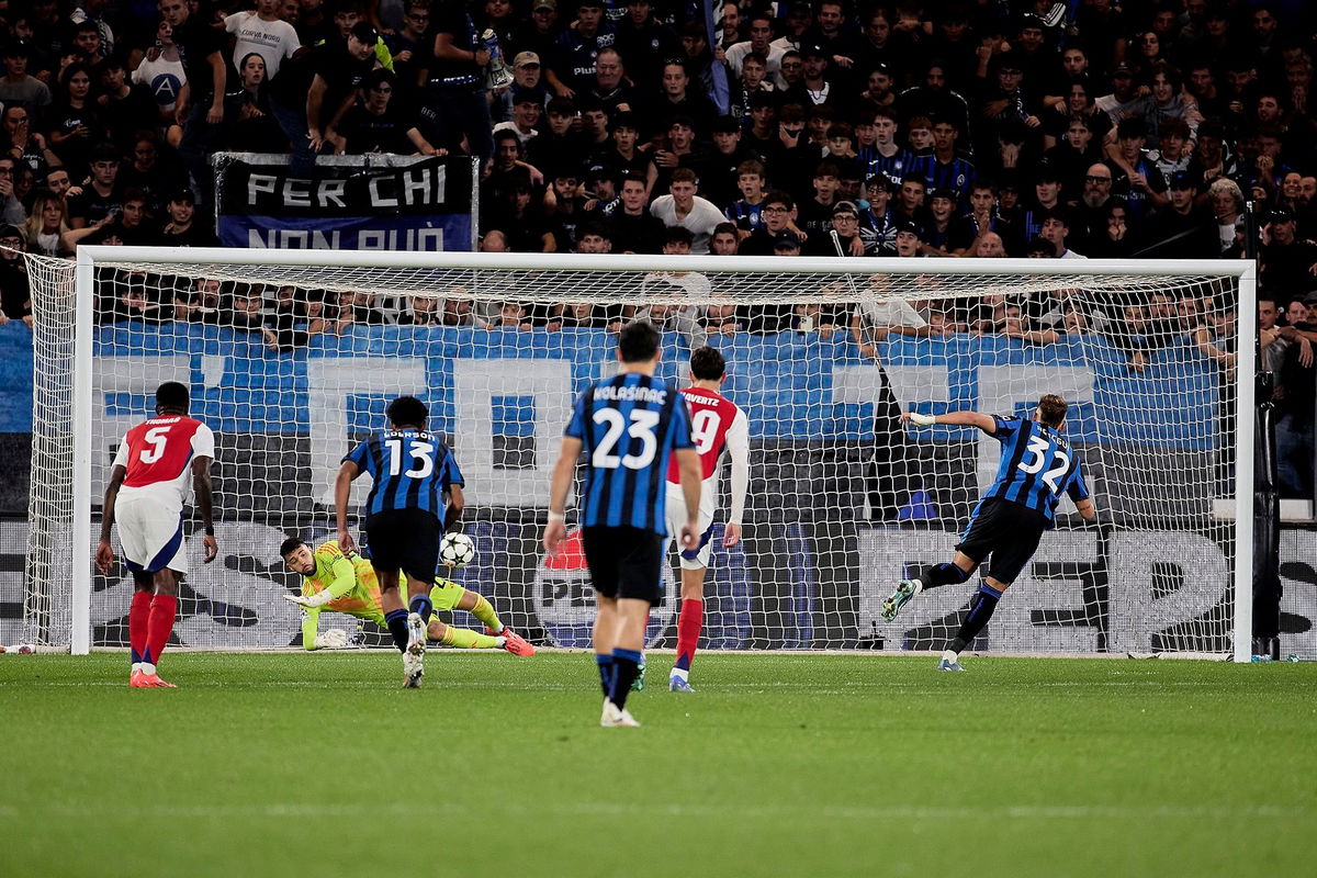 <i>Emmanuele Ciancaglini/Ciancaphoto Studio/Getty Images via CNN Newsource</i><br/>David Raya saves a penalty during the match between Atalanta and Arsenal at the Stadio di Bergamo.