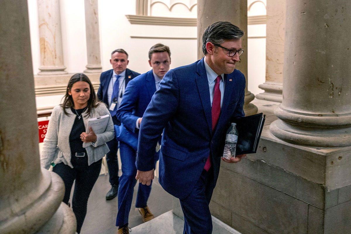 <i>Tasos Katopodis/Getty Images via CNN Newsource</i><br/>House Speaker Mike Johnson heads to his office before the vote on the government funding bill at the US Capitol on September 18