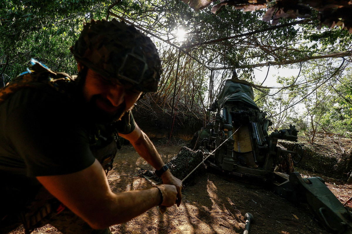 <i>Valentyn Ogirenko/Reuters via CNN Newsource</i><br/>A Ukrainian serviceman of the 148th Separate Artillery Brigade of the Ukrainian Air Assault Forces