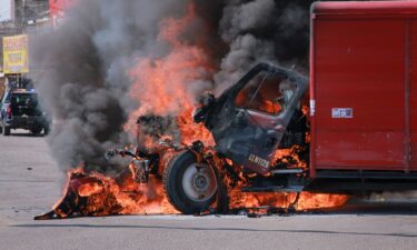 A truck on fire is seen on the streets of Culiacan