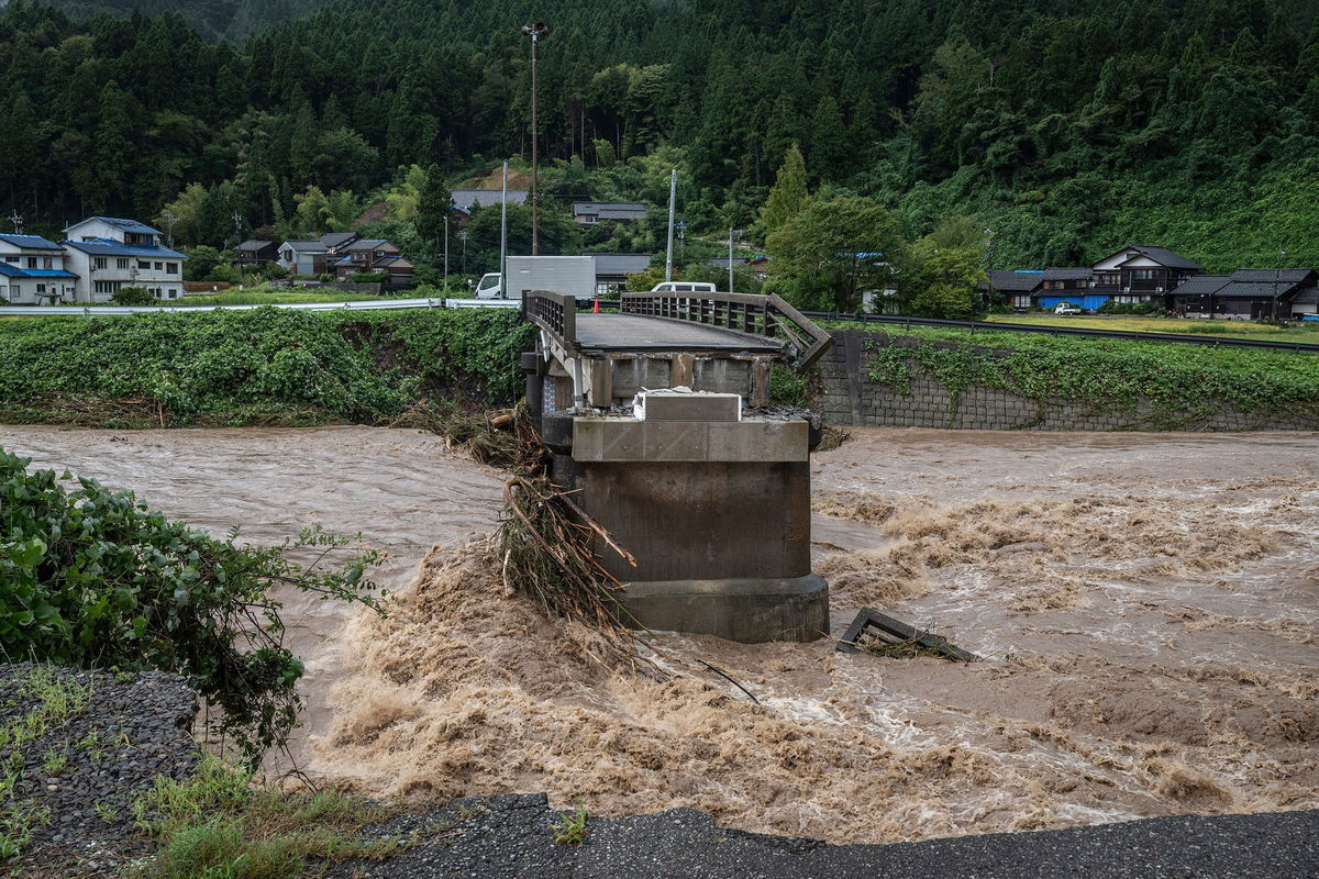 <i>Yuichi Yamazaki/AFP/Getty Images via CNN Newsource</i><br/>A collapsed bridge is seen following heavy rain in Wajima city