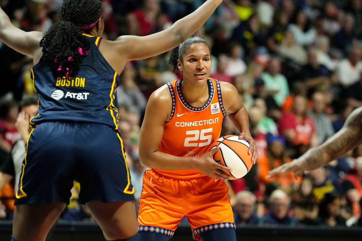 <i>Joe Buglewicz/Getty Images via CNN Newsource</i><br/>Connecticut Sun forward Alyssa Thomas looks for the open pass against the Indiana Fever in Game 1 of their first-round series at Mohegan Sun Arena.