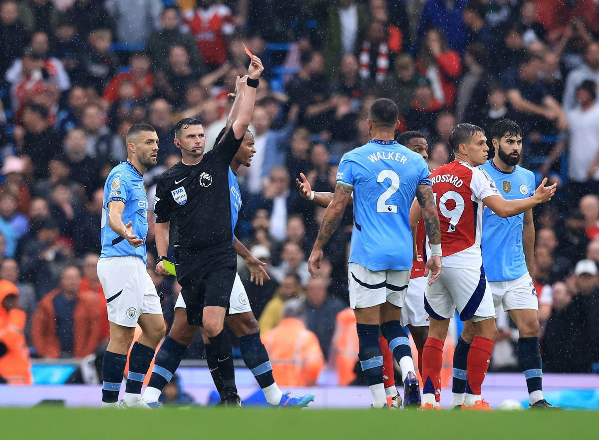 <i>Matt West/Shutterstock via CNN Newsource</i><br/>Trossard is dismissed by referee Michael Oliver.