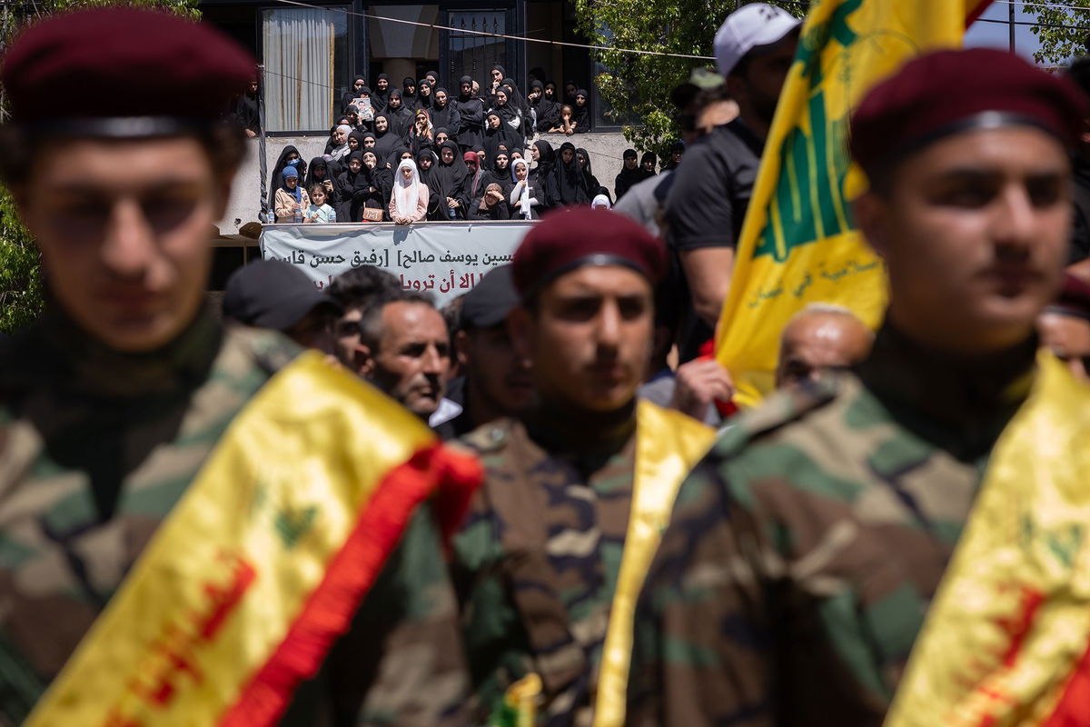 <i>Chris McGrath/Getty Images via CNN Newsource</i><br/>Women attend the funeral of Hezbollah fighters Abbas Ahmad Srour and Mohammad Hussein Kassem in Aita al Chaab