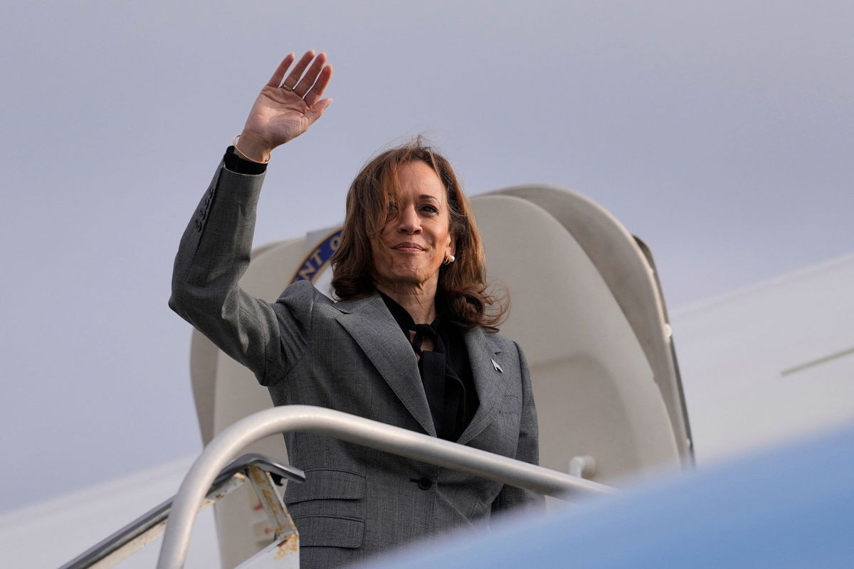 <i>Matt Rourke/Pool/AFP/Getty Images via CNN Newsource</i><br/>US Vice President and Democratic presidential candidate Kamala Harris boards Air Force Two as she departs LaGuardia Airport in Queens