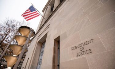 The Justice Department building is pictured on a foggy morning on December 9