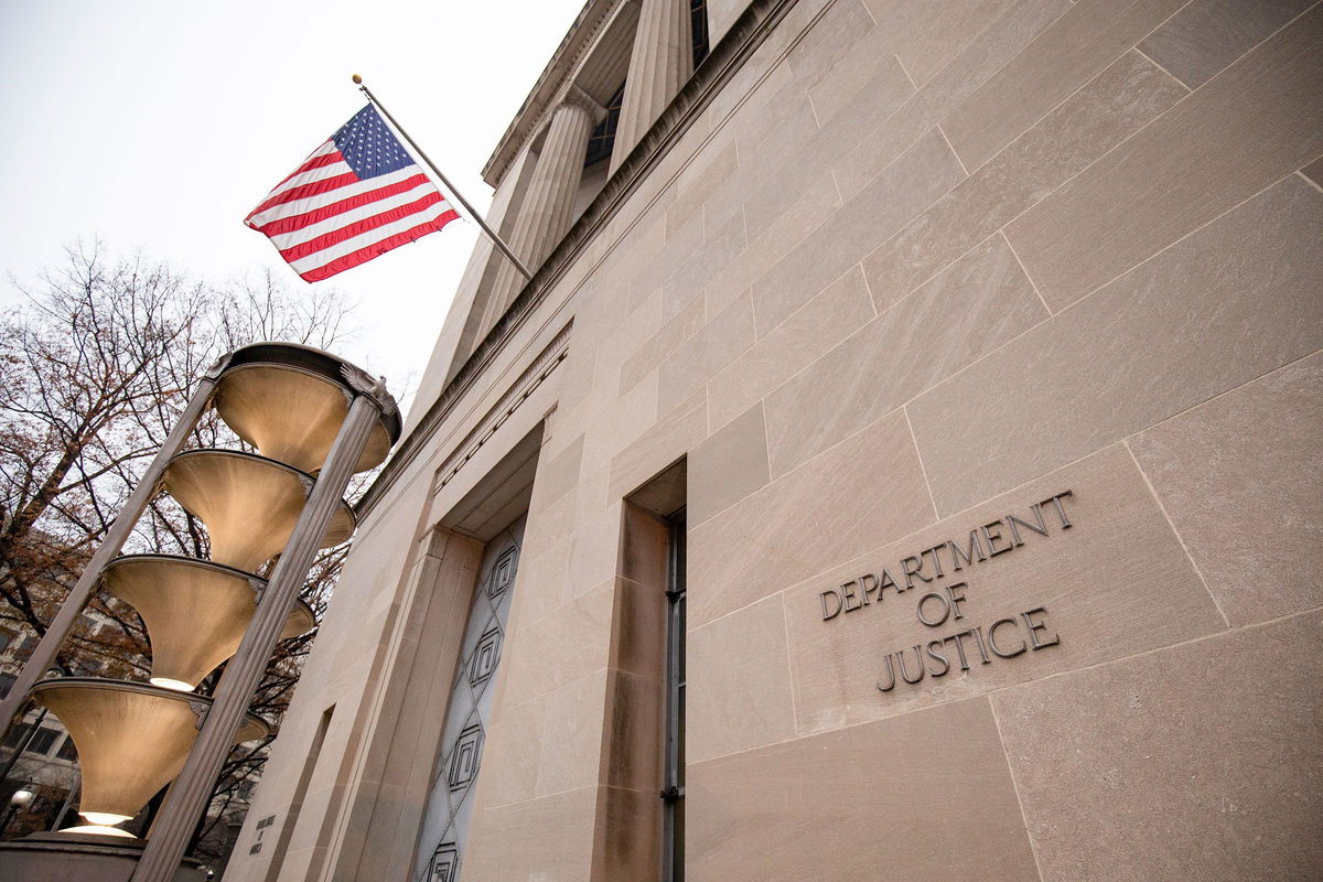 <i>Samuel Corum/Getty Images via CNN Newsource</i><br/>The Justice Department building is pictured on a foggy morning on December 9