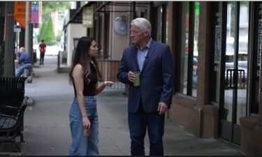 Georgia voter Christine Nguyen and John King in Decatur