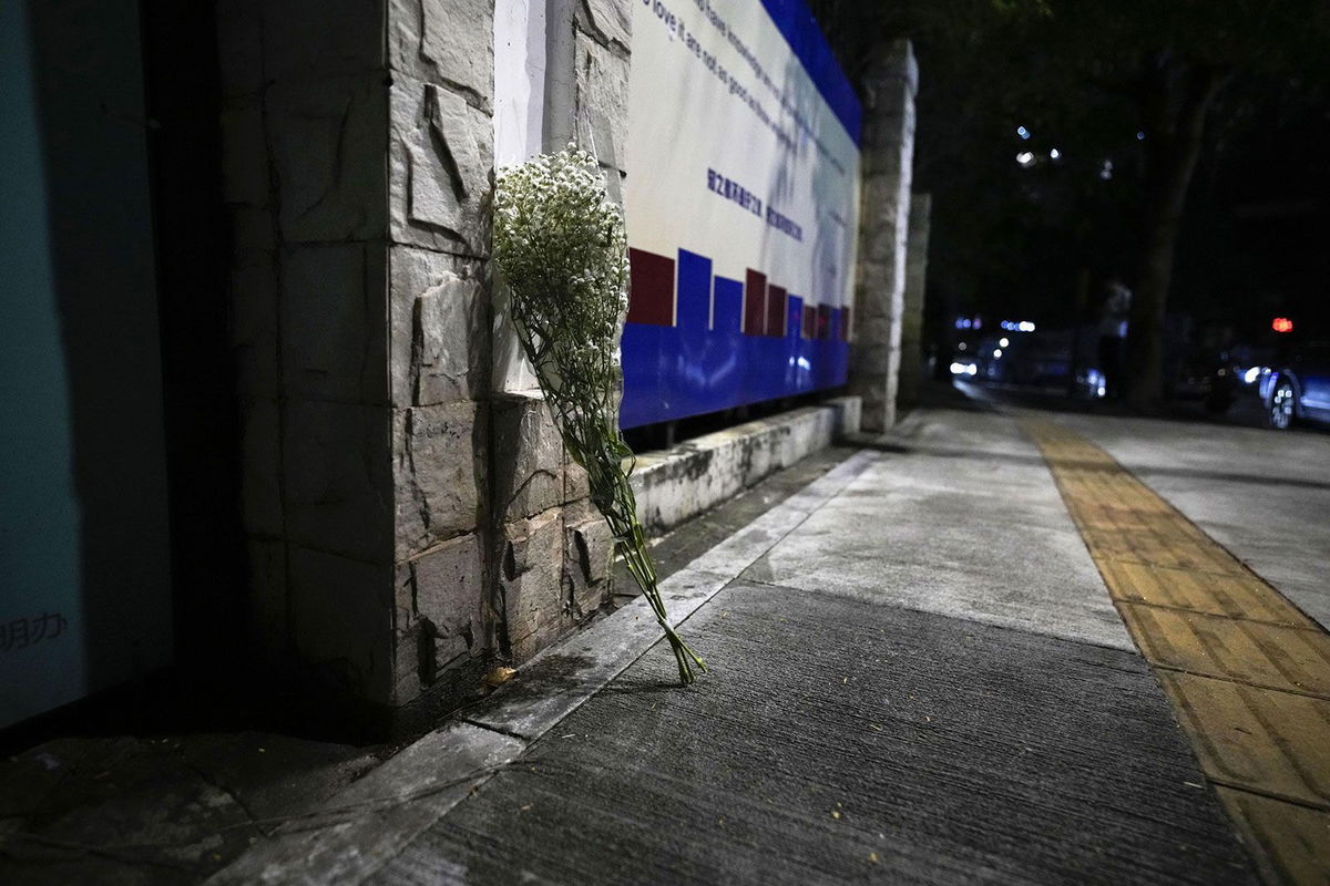 <i>Kyodo News/Getty Images via CNN Newsource</i><br/>While flowers are placed at the location where the boy was fatally stabbed.