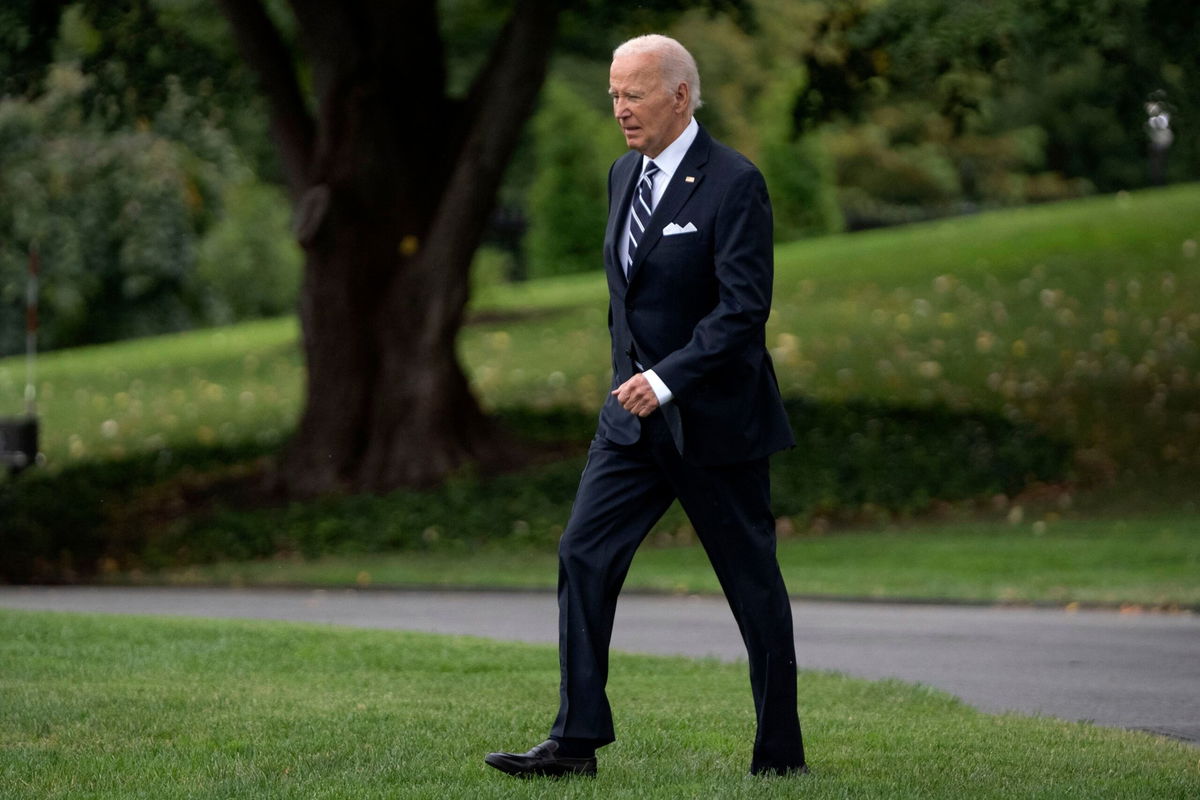 <i>Mark Schiefelbein/AP via CNN Newsource</i><br/>President Joe Biden walks out of the White House to board Marine One on the South Lawn in Washington