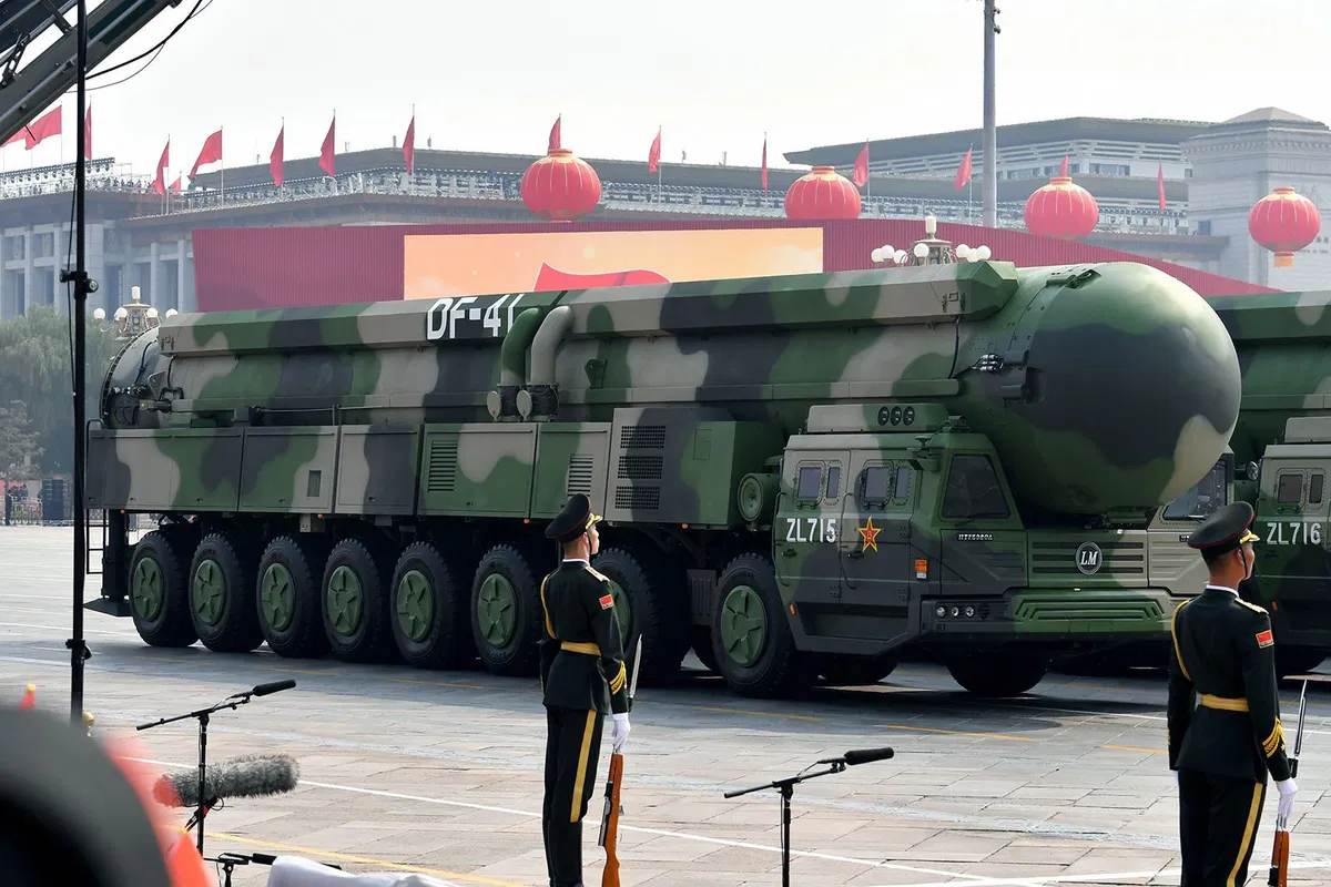 <i>The Asahi Shimbun/Getty Images/File via CNN Newsource</i><br/>Military vehicles carrying DF-41 intercontinental ballistic missiles roll during a parade to celebrate the 70th anniversary of the founding of the People's Republic of China on October 1