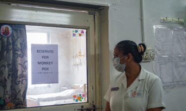 A nurse stands next to a newly created mpox isolation ward at a hospital in Ahmedabad