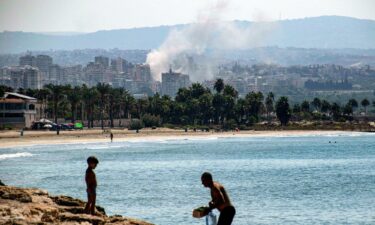 A cloud of smoke erupts during Israeli air strikes on a village south of Tyre in southern Lebanon on September 25.